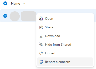 Screenshot of how to report abuse in OneDrive