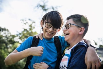 Two young boys laughing